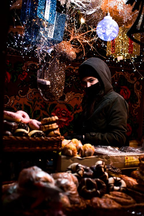 Woman around Decorations and Cookies 