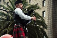 Men Playing Wind Instrument