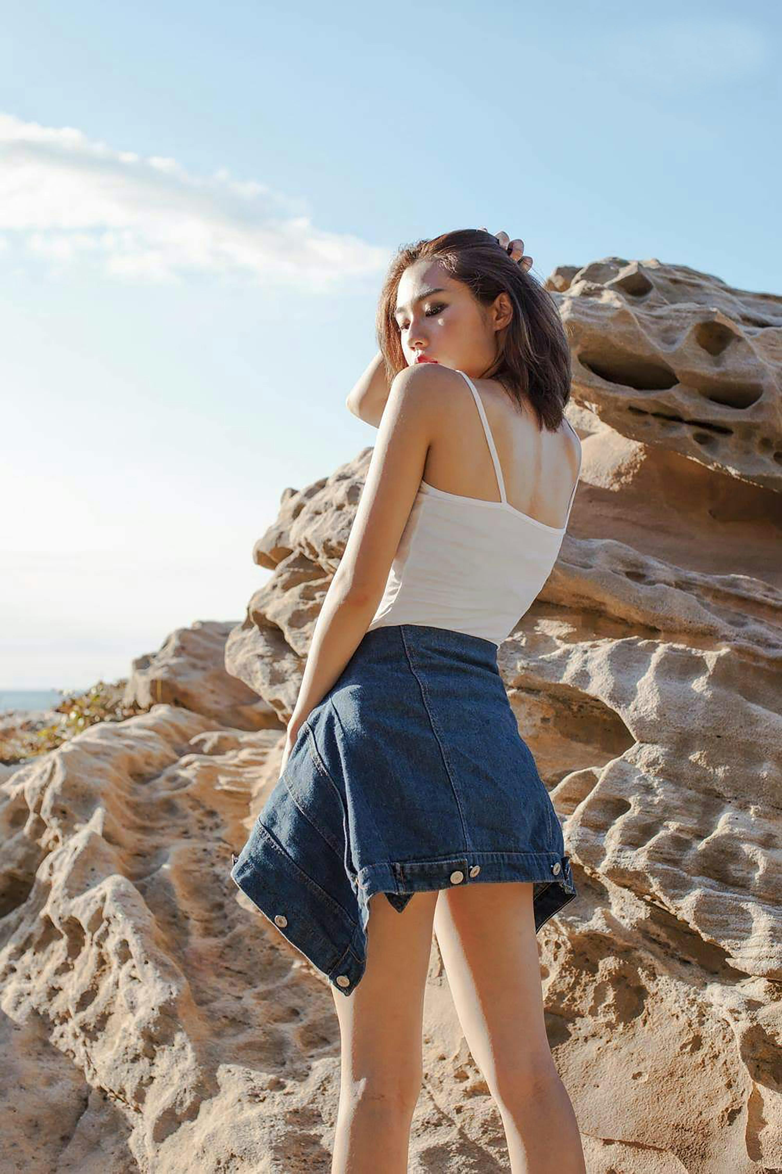 Beautiful Woman in White Tank Top