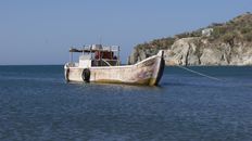 Brown and Beige Boat on Sea