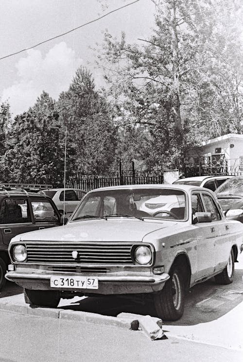 Grayscale Photo of a Volga GAZ-24