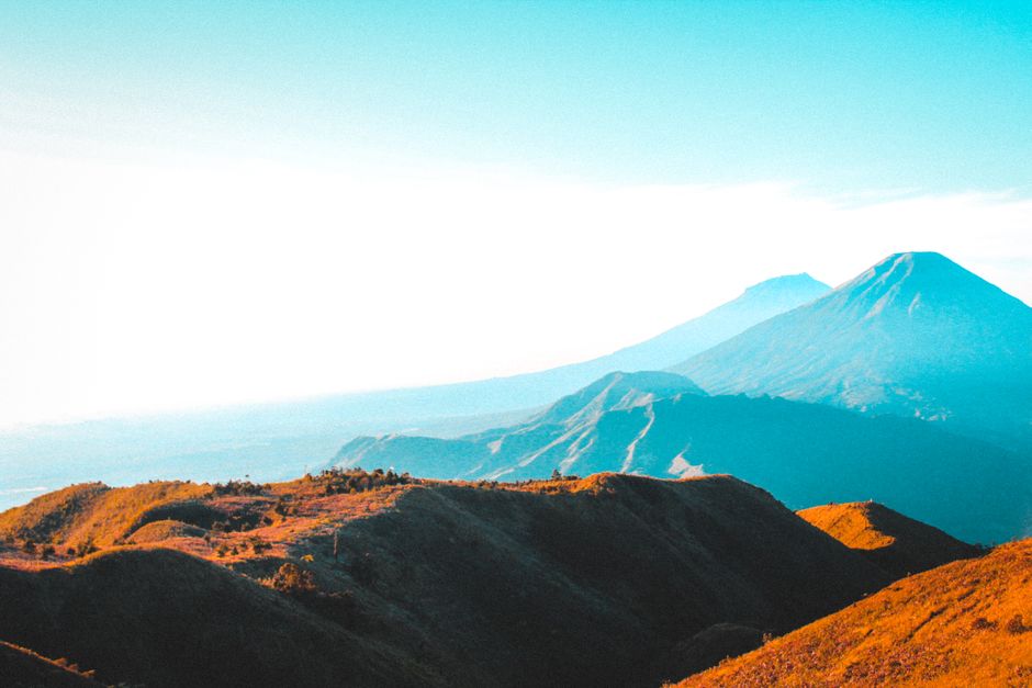 Stunning morning view of mountains in Sukorejo, Central Java, showcasing a vivid landscape.
