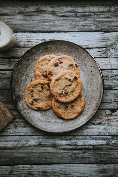 Free Chocolate Chip Cookies on Wooden Table Stock Photo