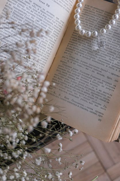 A Pearl Necklace on a Book · Free Stock Photo