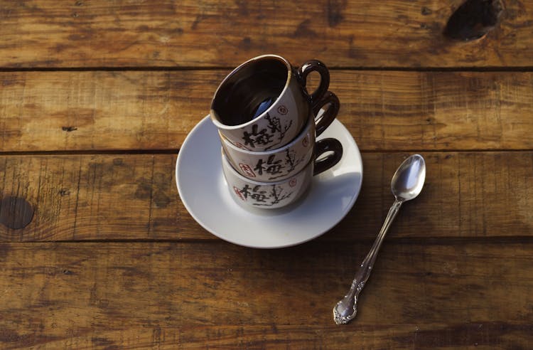 Stack Of Cups On A Saucer