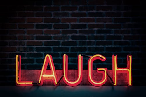 Free Laugh Neon-light Signage Turned on Stock Photo