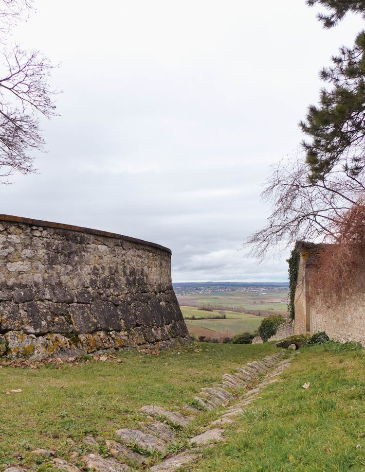 View Of Fields In Gap Between Historical Walls