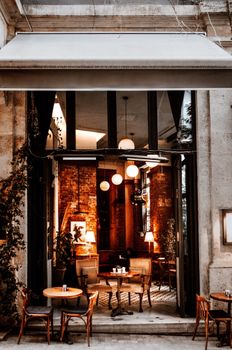 Warm and inviting cafe setting with rustic decor, perfect for relaxing.