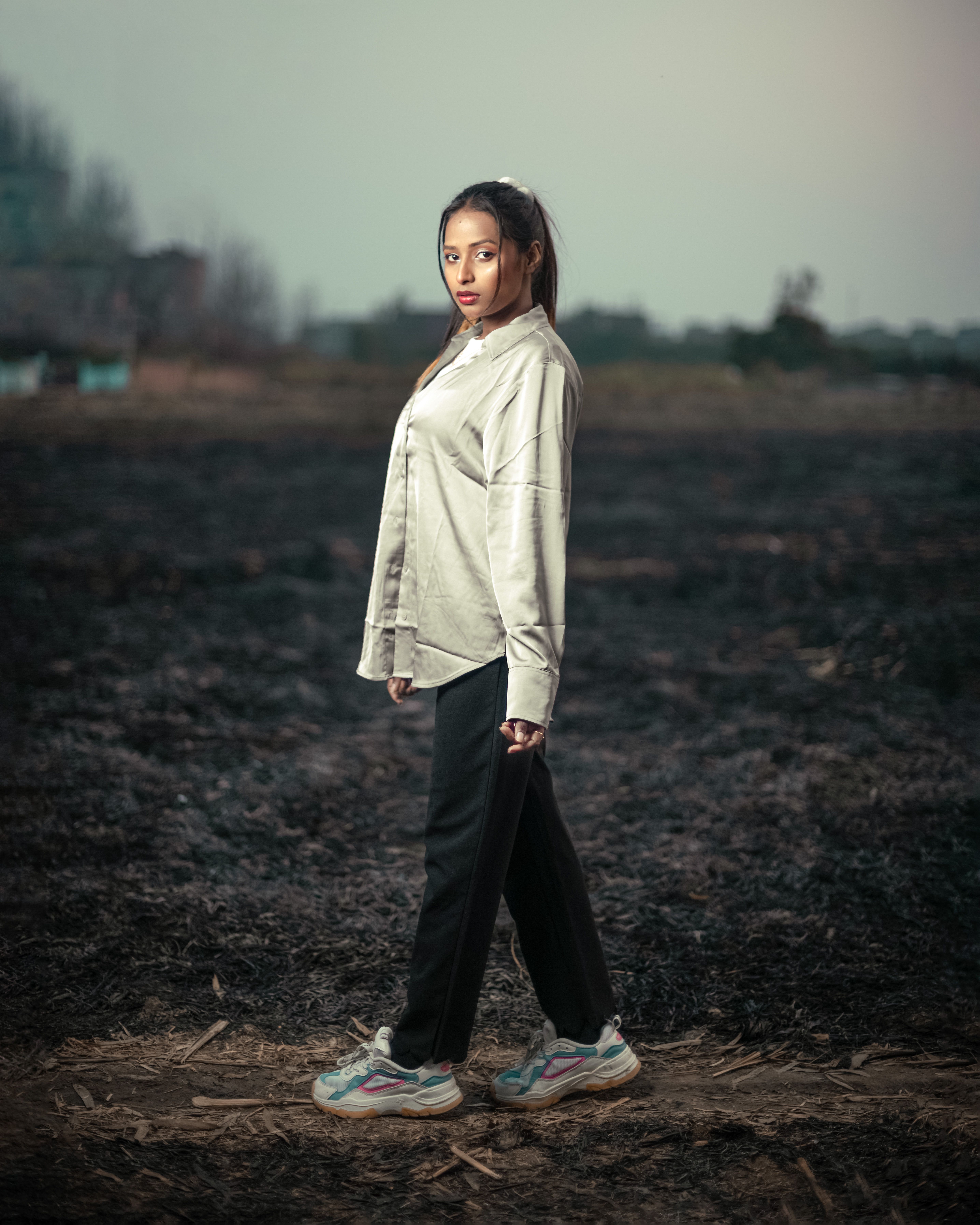 Woman Wearing Long Sleeves Standing in the Field · Free Stock Photo