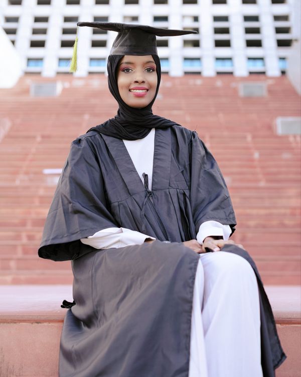 Portrait of Hijabi Woman Wearing Graduation Cap  Free Stock Photo