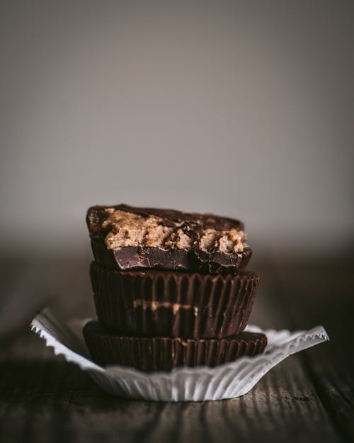 Free Chocolate Peanut Butter Cups in White Paper Cup Stock Photo