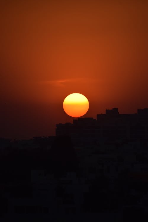 Free Orange Sun During Sunset Stock Photo