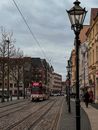 Red Tram Near Buildings
