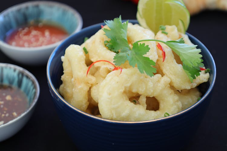 Calamari On Bowl With Parsley Garnish