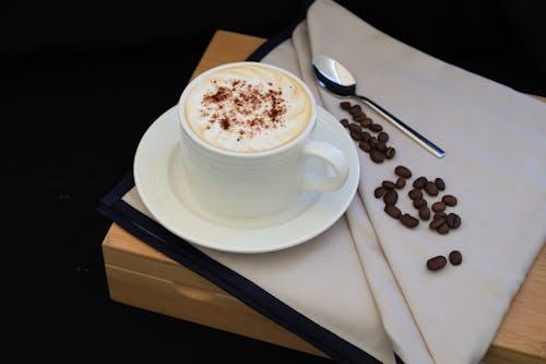 A Cup of Coffee on Top of a Wooden Box