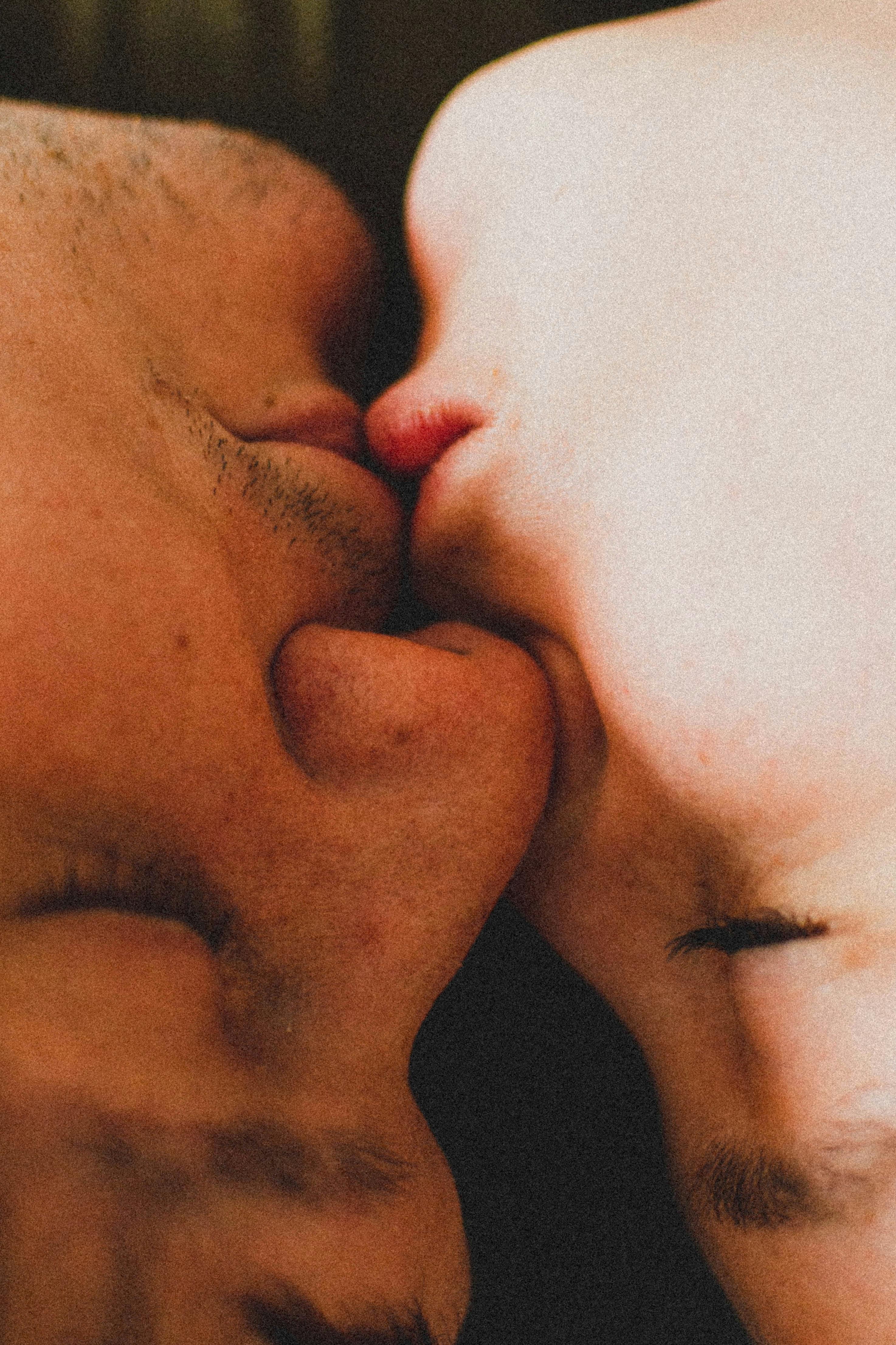 Close-up Photo of a Couple Kissing · Free Stock Photo