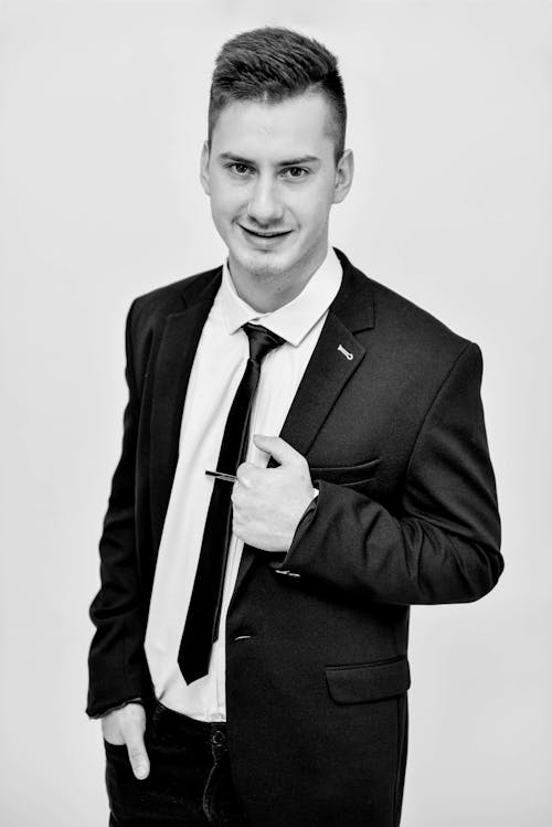 Free Black and White Photo of a Man in Black Suit Stock Photo