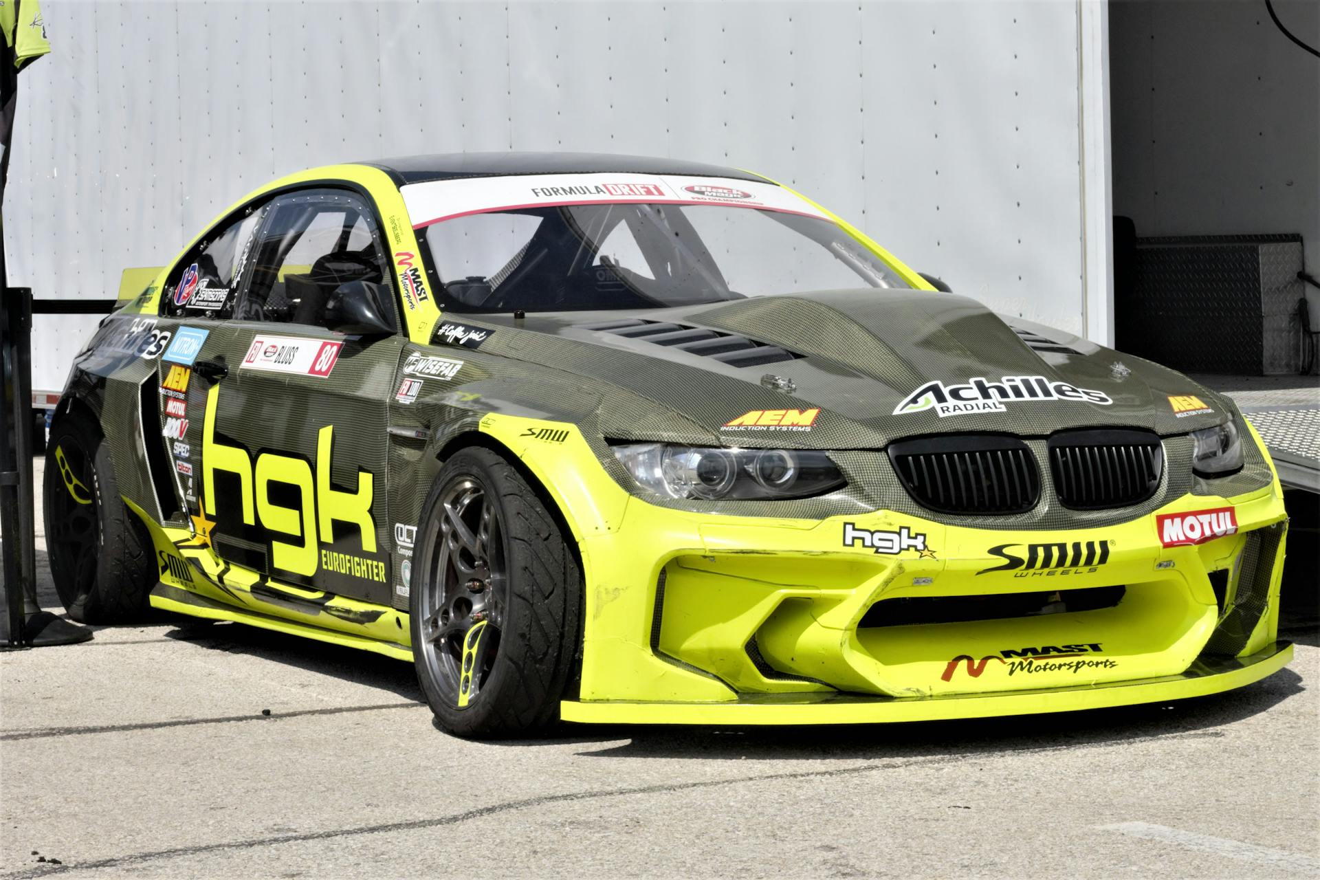 Stock Car Covered in Various Logos