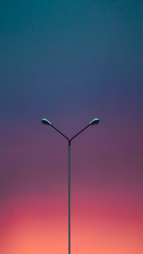 Street Lights Under Dramatic Sky