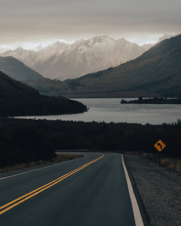 Landscape With Road, Lake And Mountains