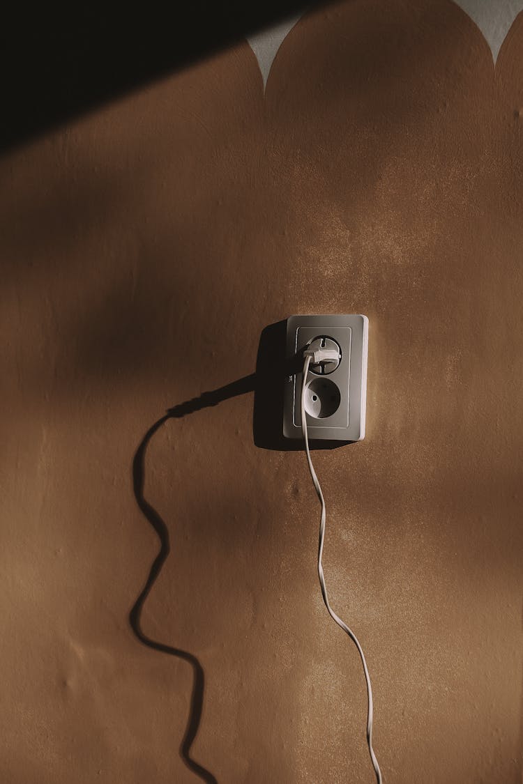 An Electrical Socket On A Wall