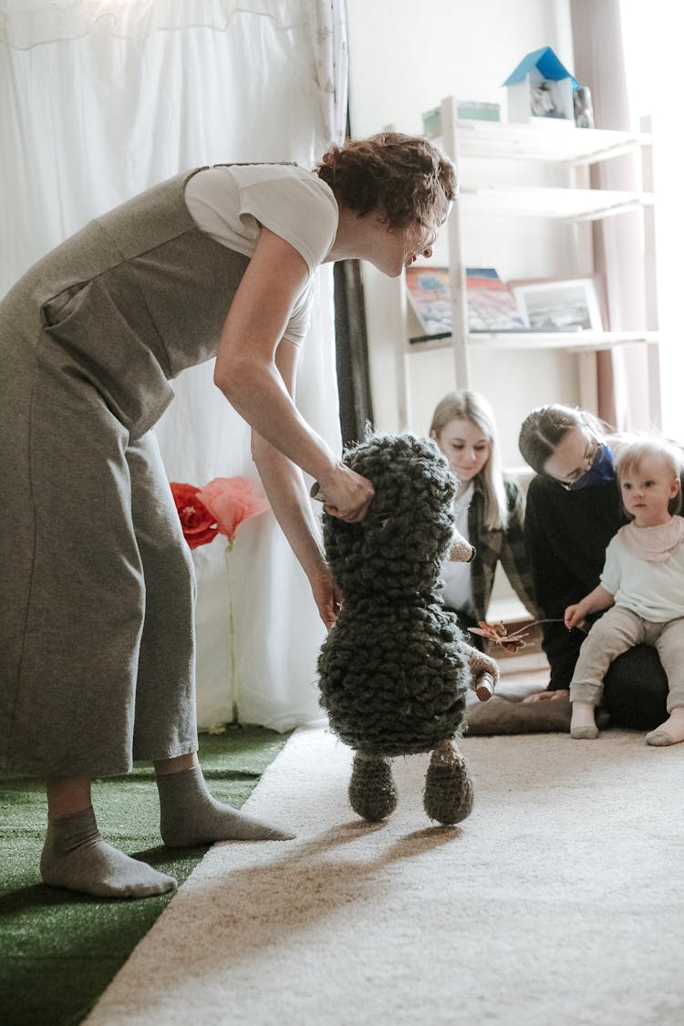 Teacher Working At Nursery 