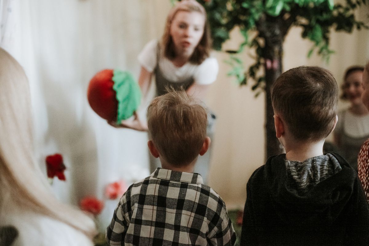Teacher and young children