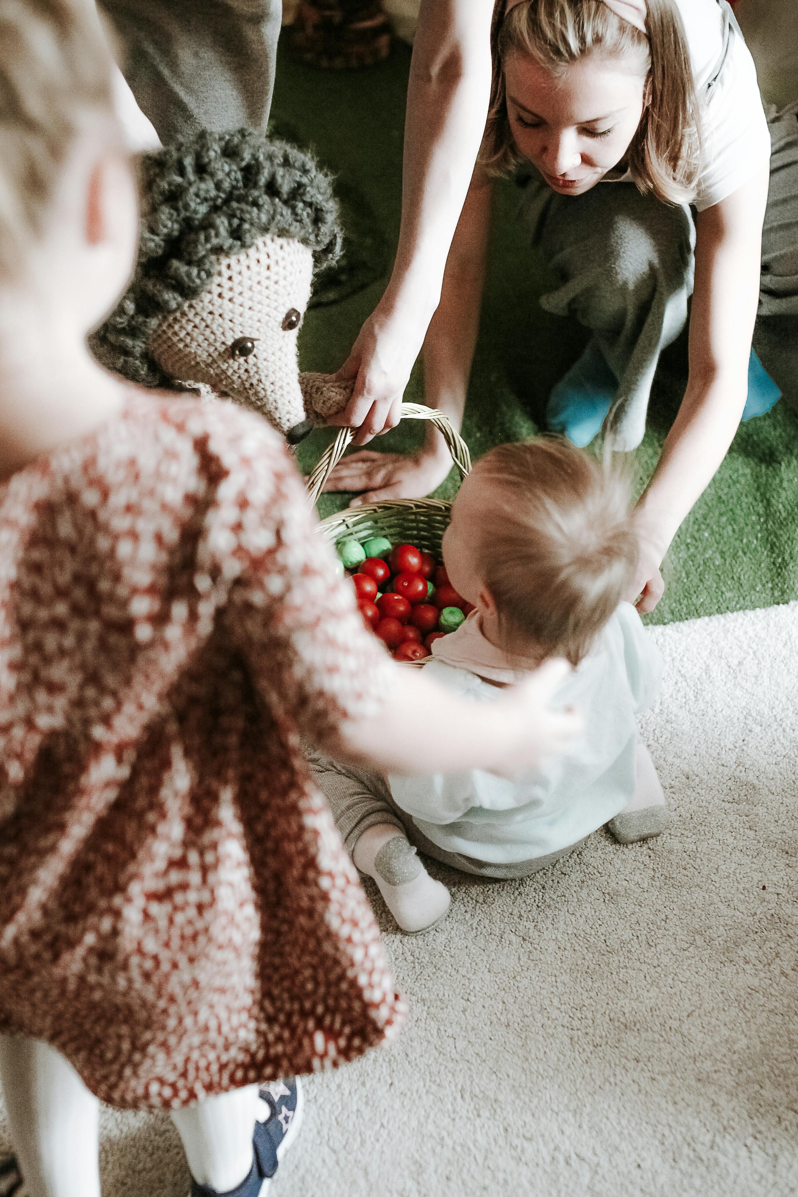 mother with children on floor