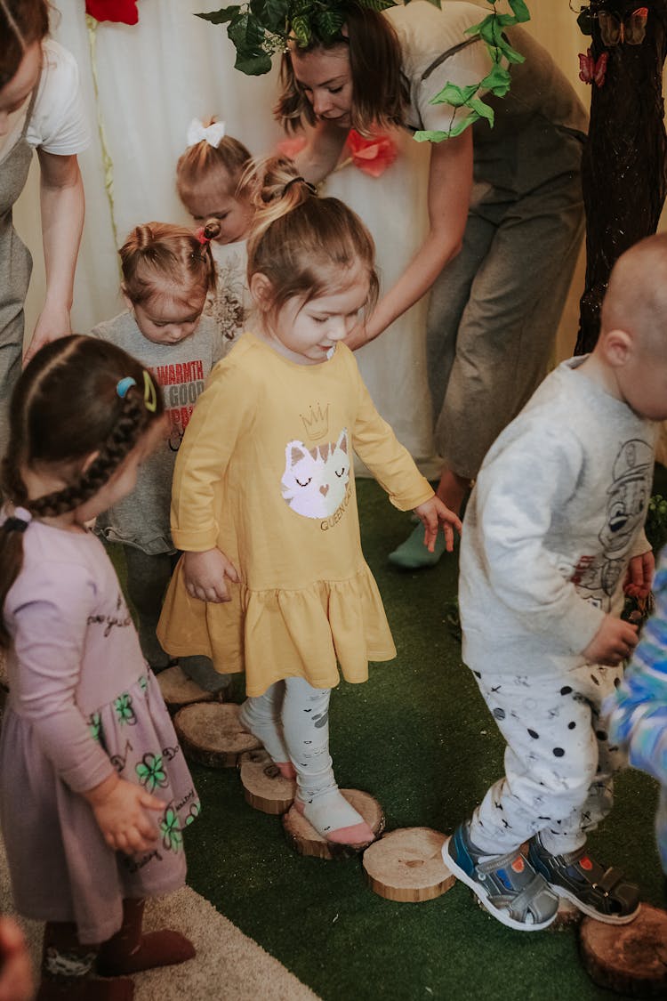 Lined Up Children Playing 
