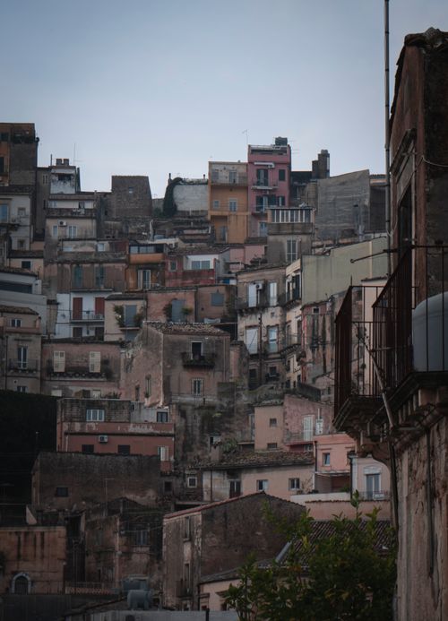 Free Explore a captivating cityscape of densely packed, rustic houses on a Mediterranean hillside. Stock Photo