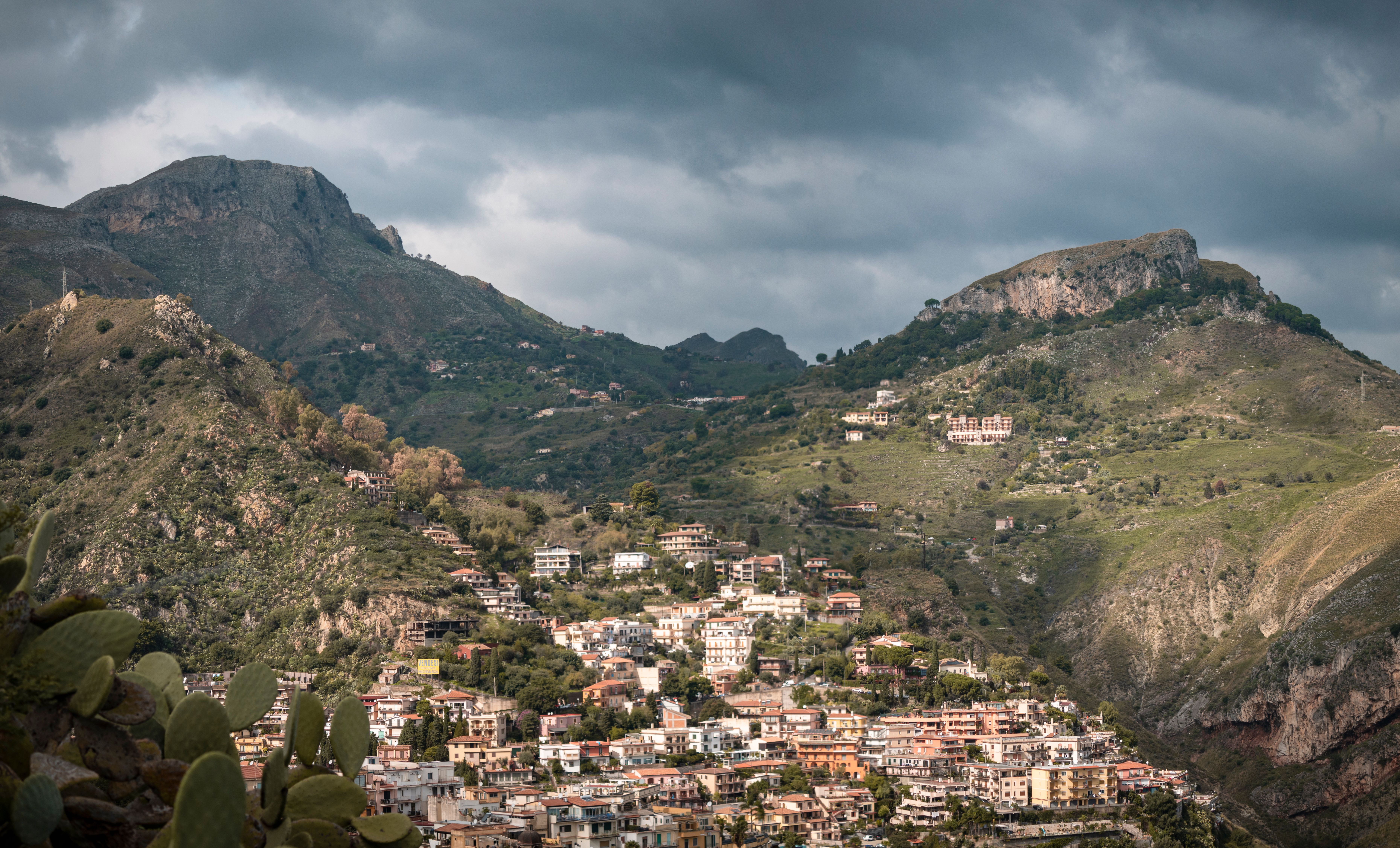 Aerial View of City in Mountain Valley · Free Stock Photo