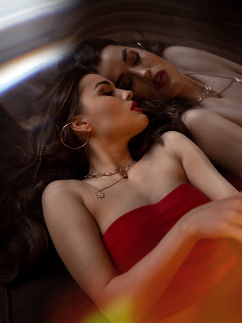 Reflection of Sleeping Woman in Red Dress