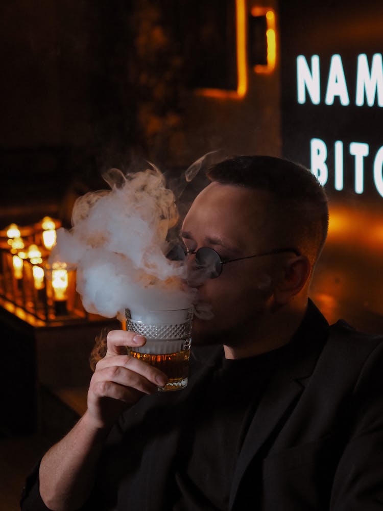 Man Drinking And Smoking