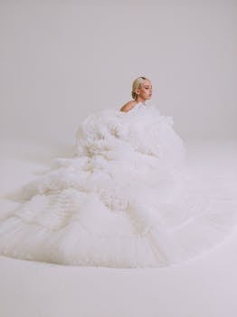 Stunning bridal portrait featuring a woman in a voluminous white gown, perfect for a wedding shoot.