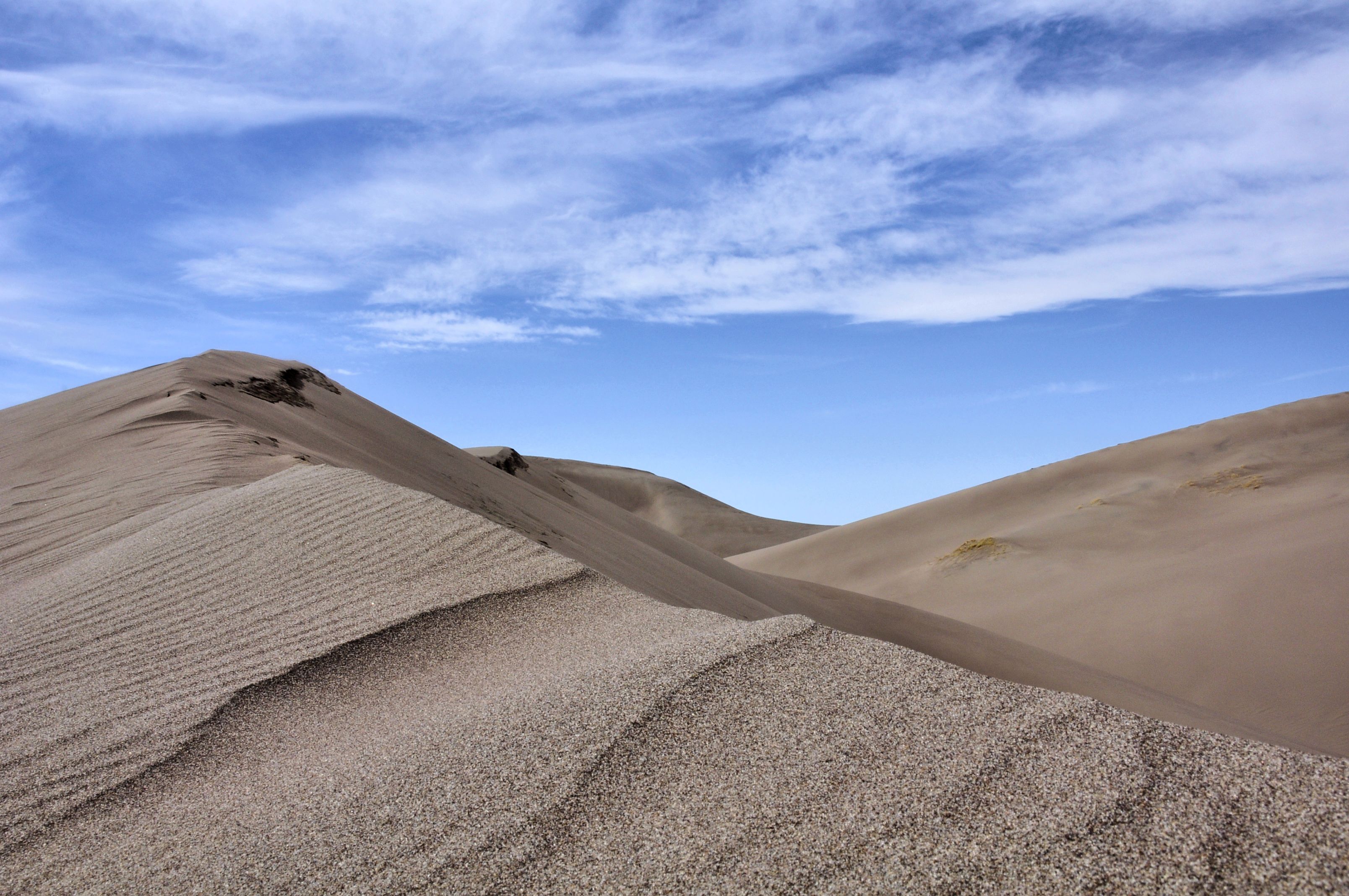 A Desert under a Cloudy Sky · Free Stock Photo