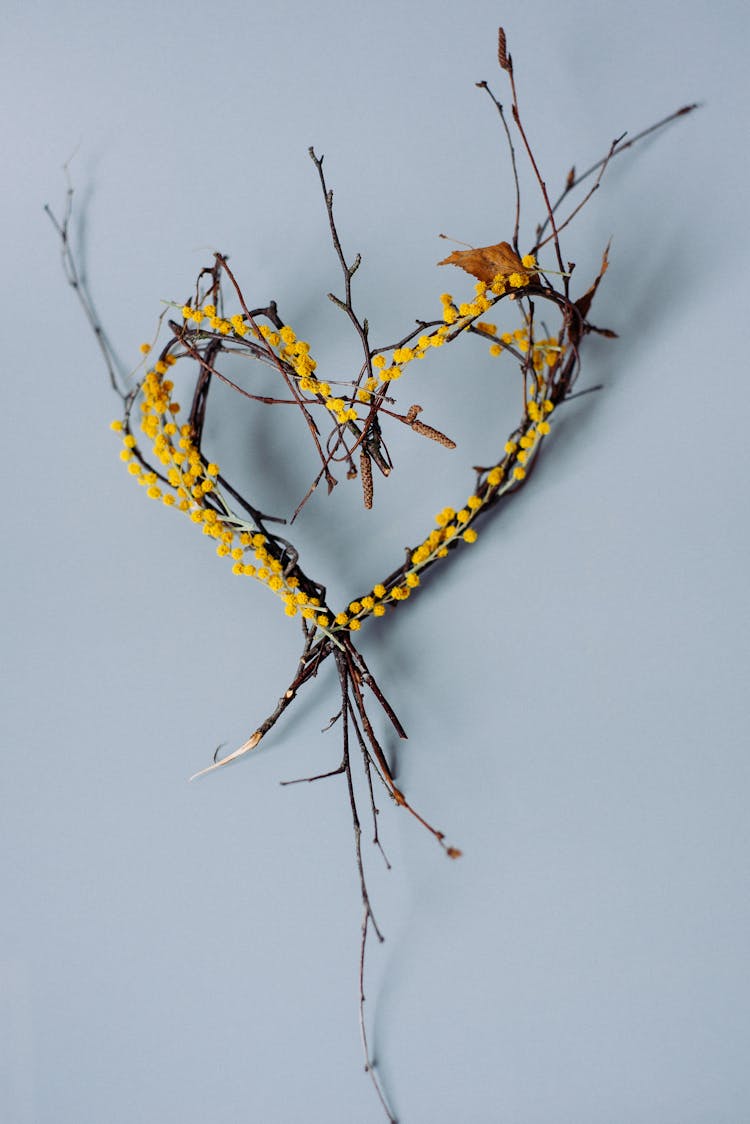 Branch With Flowers In Heart Pattern