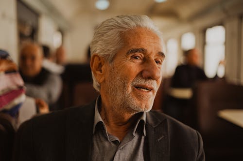 Free Close-Up Shot of an Elderly Man Smiling Stock Photo