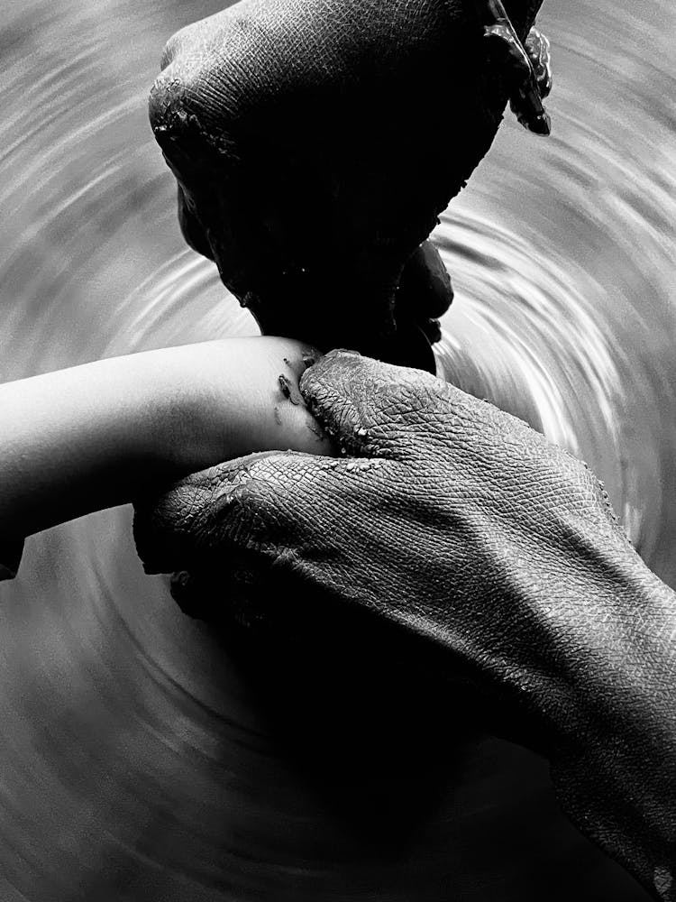 Hand On Pottery Wheel