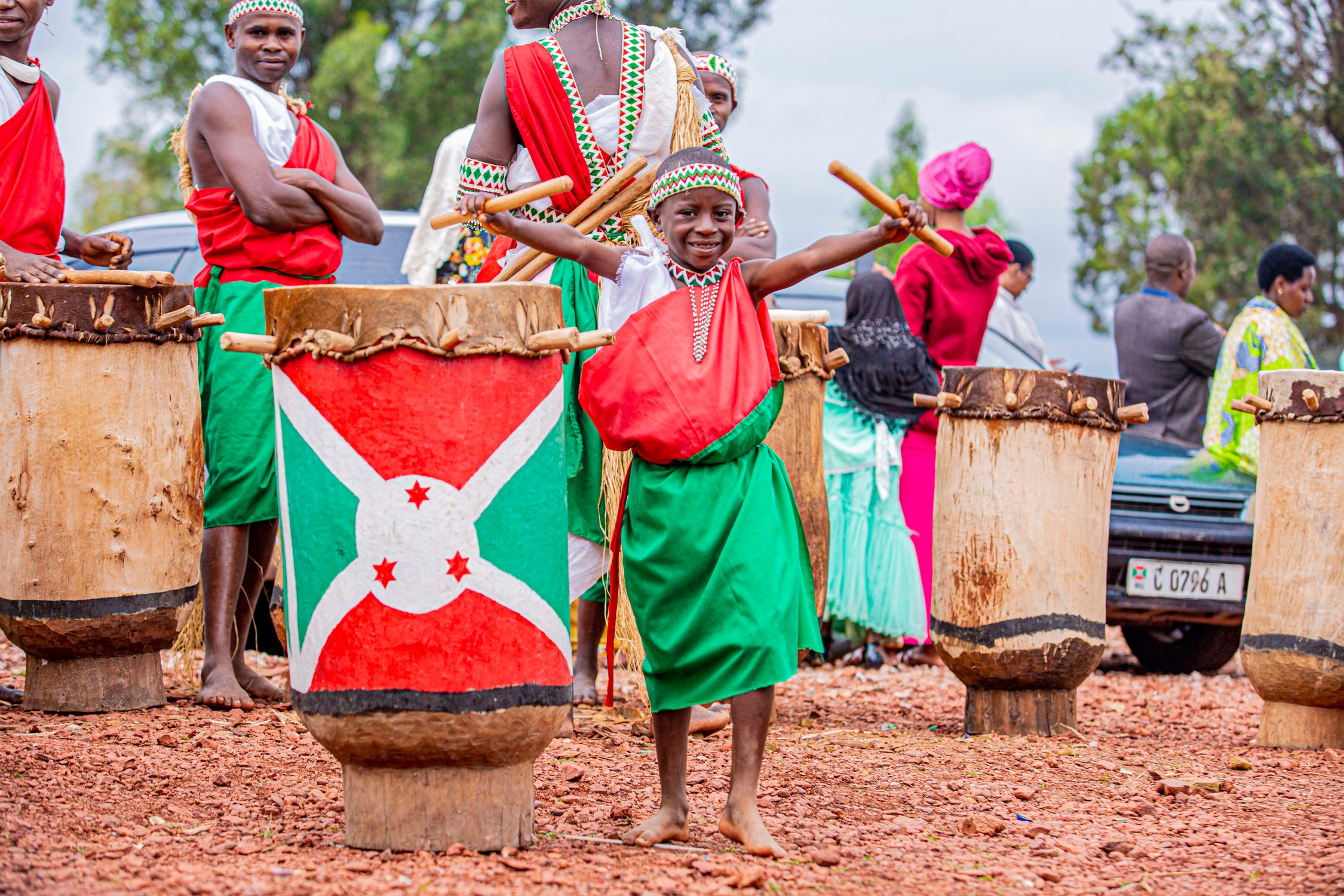 A Girl in Traditional Dress Holding Sticks Beside Ingoma Drum · Free ...