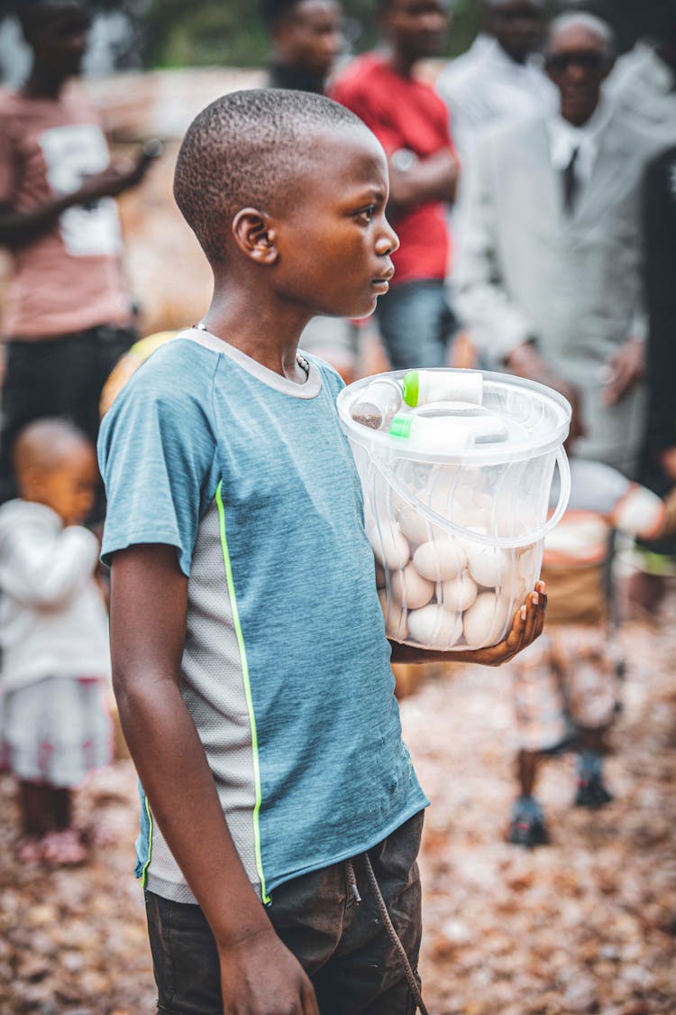 A Boy Selling A Eggs