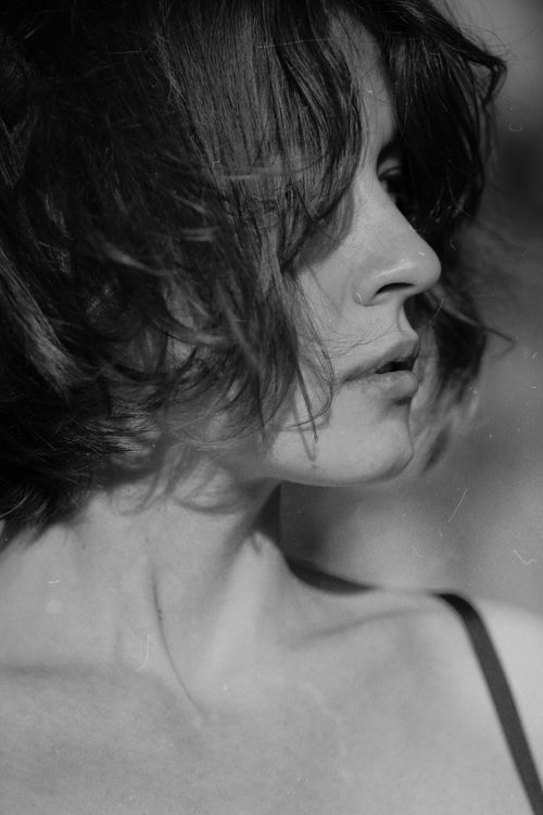Free Artistic monochrome portrait of a woman with short hair emphasizing timeless beauty. Stock Photo