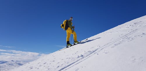 Man Skiing on Hill