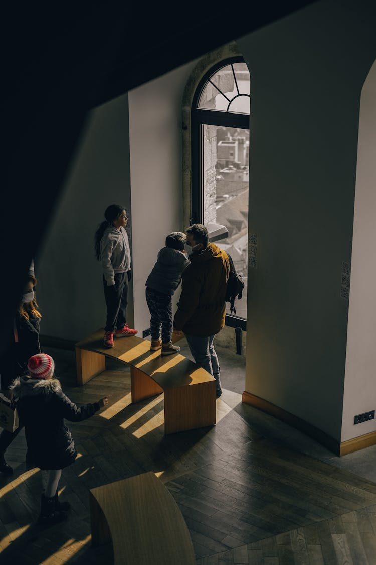 Tourists With Children In Museum