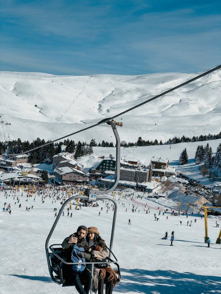 Couple Using Ski Lift