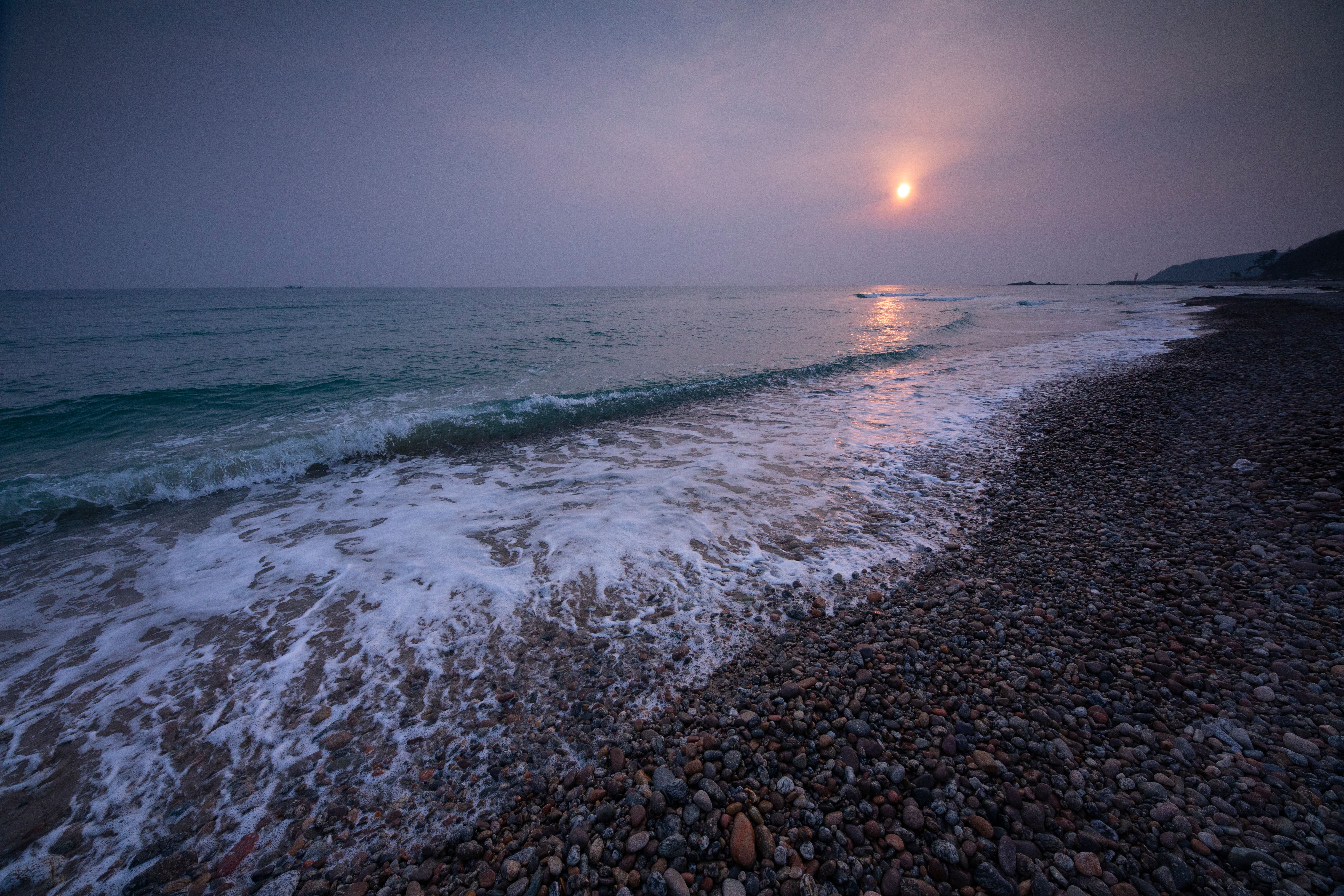 Waves Crashing on the Shore during Sunset · Free Stock Photo