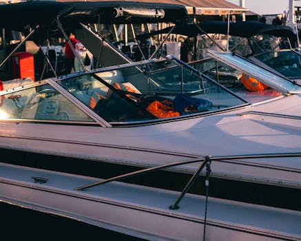 A stylish speedboat docked at a marina in Sochi, Russia during a sunny day.