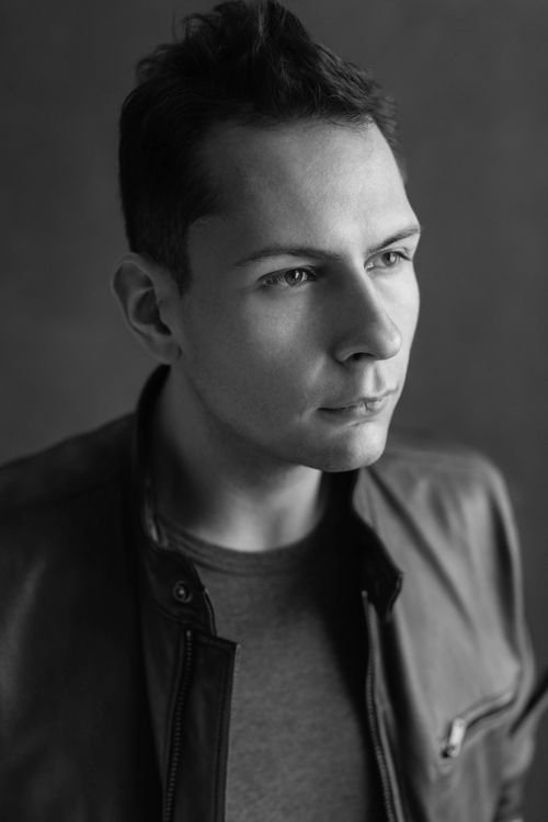 Free Monochrome portrait of a serious man in a jacket, showcasing depth and emotion. Stock Photo