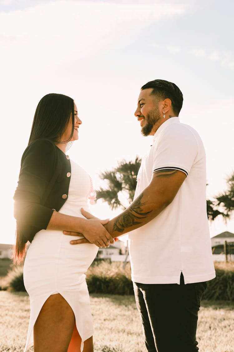 Happy Pregnant Woman With Partner