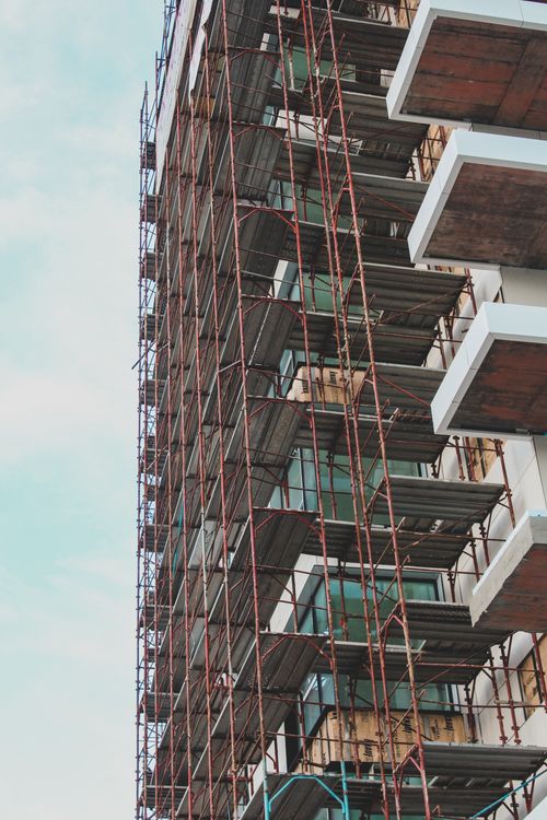 Free High-rise building in Berlin under construction with visible scaffolding. Stock Photo