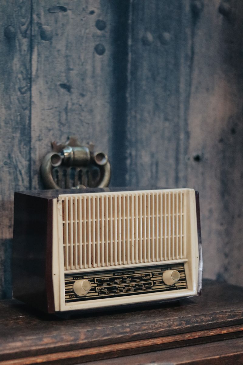 Close-up of a vintage radio dial and knobs